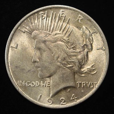 1924 PEACE DOLLAR BU. CHECK OUT OUR UPCOMING AUCTIONS ESTIMATE $130 - $150.