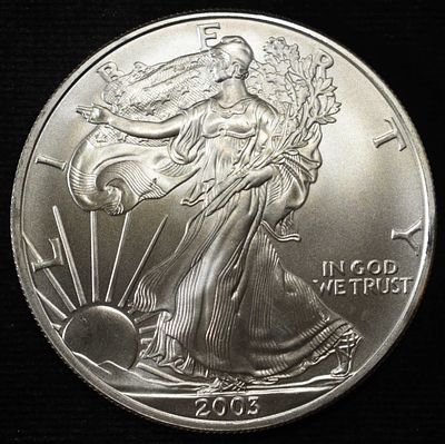 2003 AMERICAN SILVER EAGLE. CHECK OUT OUR UPCOMING AUCTIONS ESTIMATE $130 - $180.