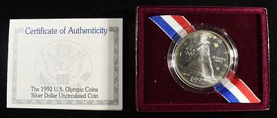 1992-D $1 COMMEM OLYMPIC. LEADERS IN ON-LINE AUCTIONS ESTIMATE $75 - $100.
