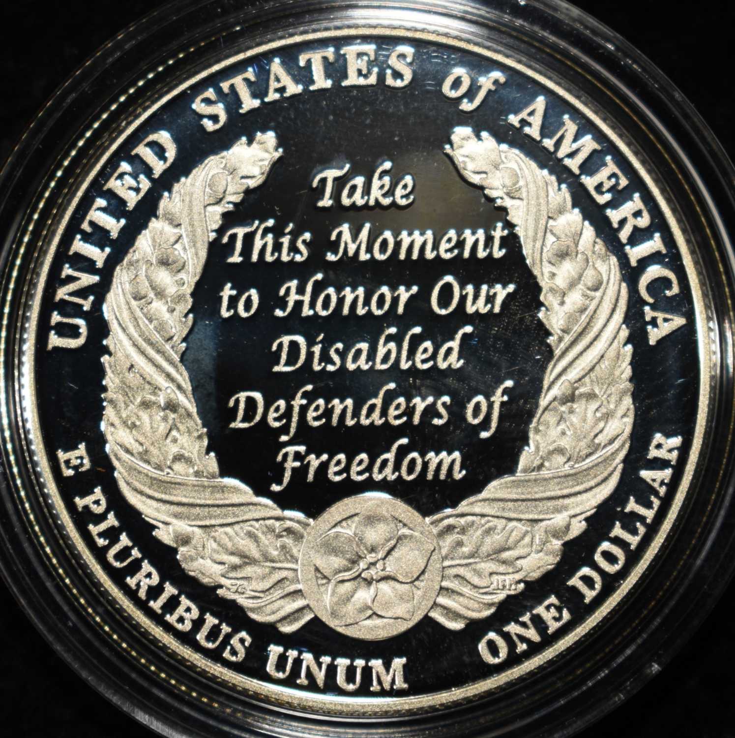 2010 $1 COMMEM AMERICAN VETERANS .999 1 OZ