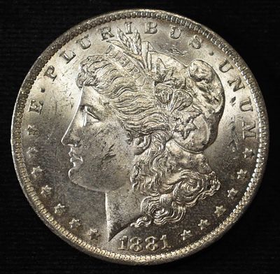 1881-O MORGAN DOLLAR BU. CHECK OUT OUR UPCOMING AUCTIONS ESTIMATE $100 - $130.