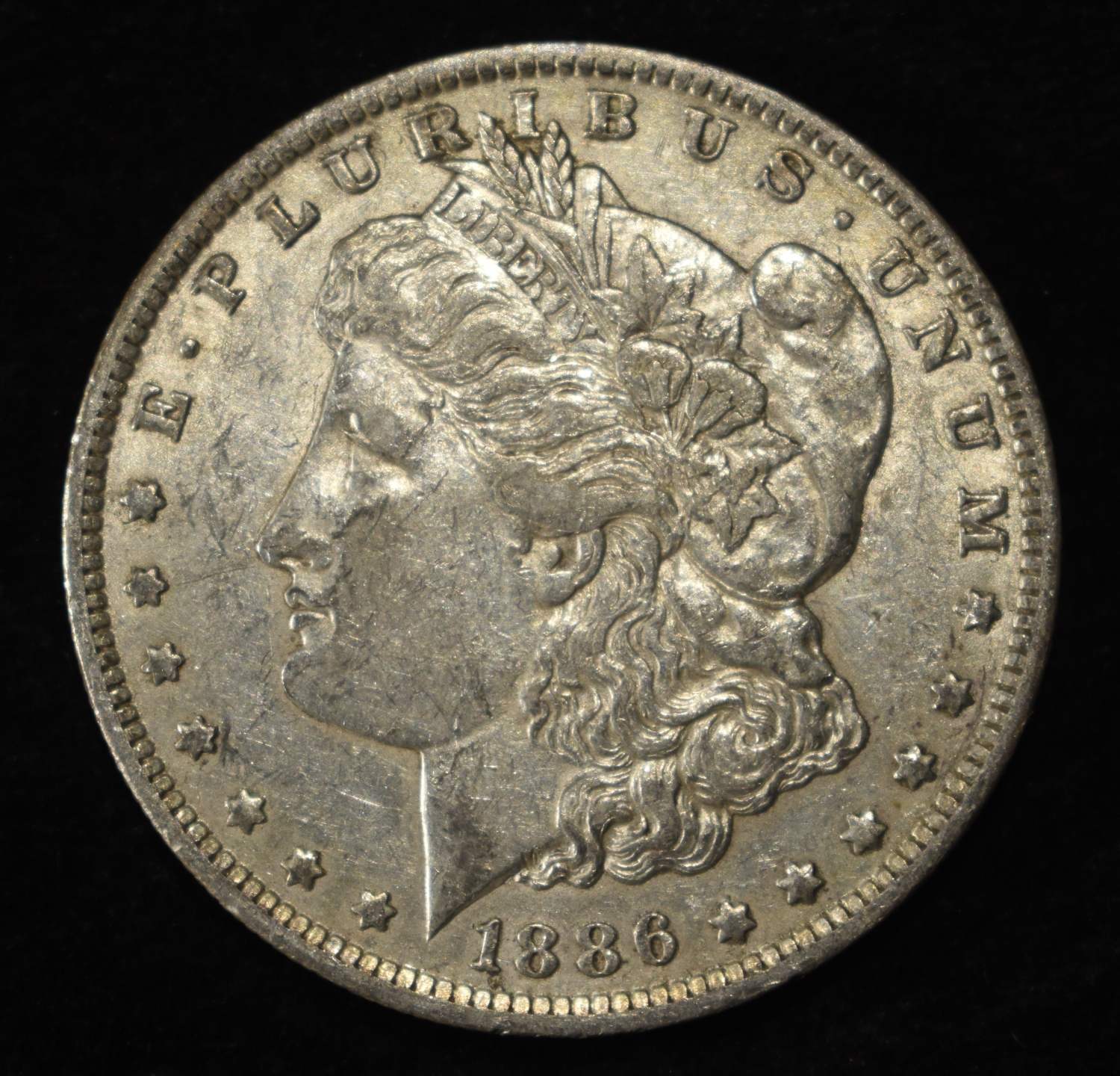 1886-O MORGAN DOLLAR XF/AU