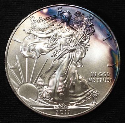 2011 AMERICAN SILVER EAGLE. LEADERS IN ON-LINE AUCTIONS ESTIMATE $90 - $130.