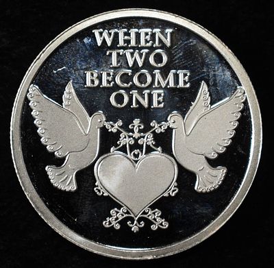 WEDDING 1 OZ .999 SILVER ROUND. WEEKLY COIN & CURRENCY AUCTIONS ESTIMATE $120 - $170.