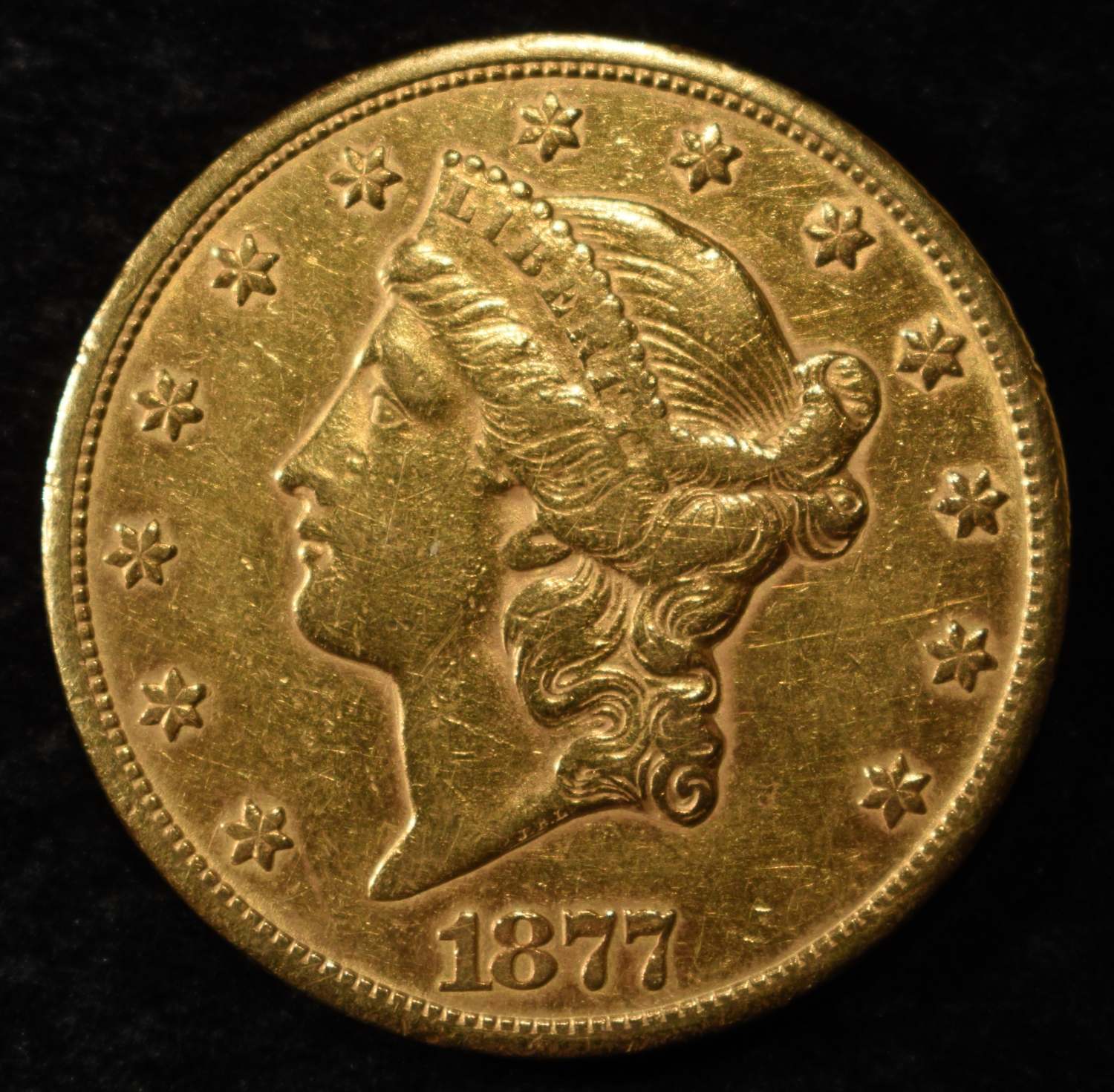 1877-CC $20 GOLD LIBERTY T3 AU