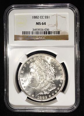 1882-CC MORGAN DOLLAR NGC MS-64. TOP RATED AUCTION HOUSE ESTIMATE $500 - $600.