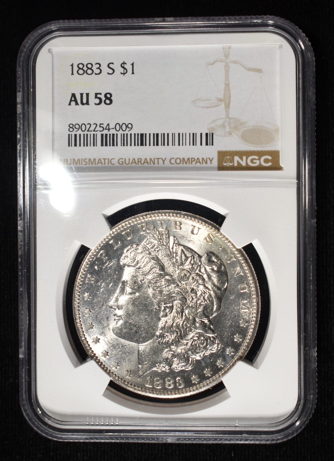 1883-S MORGAN DOLLAR NGC AU-58