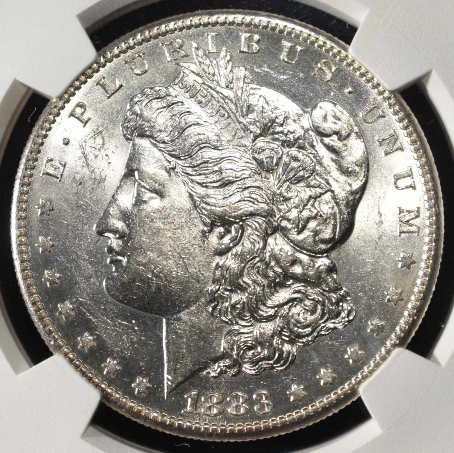 1883-S MORGAN DOLLAR NGC AU-58