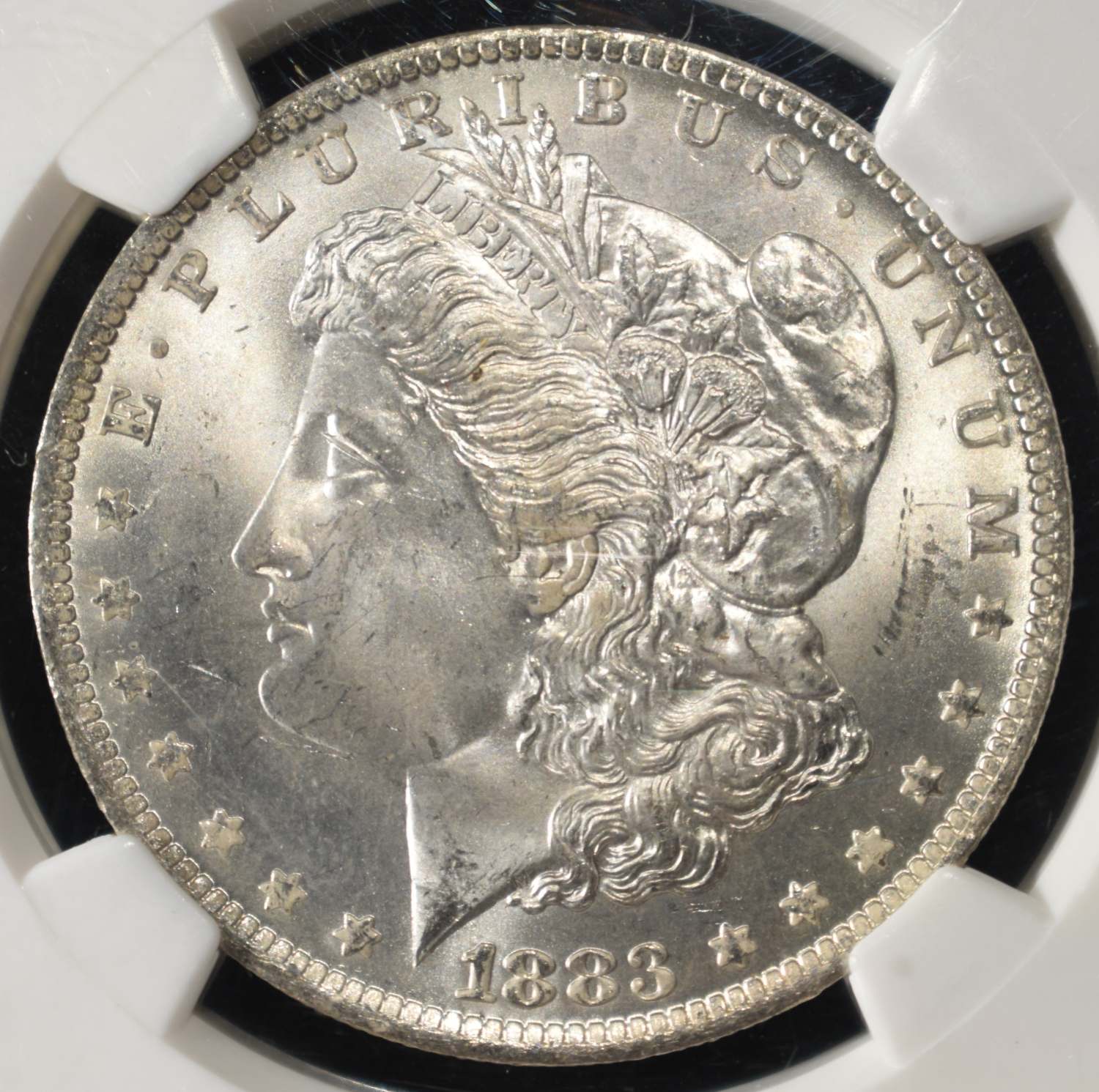 1883-O MORGAN DOLLAR NGC MS-65+