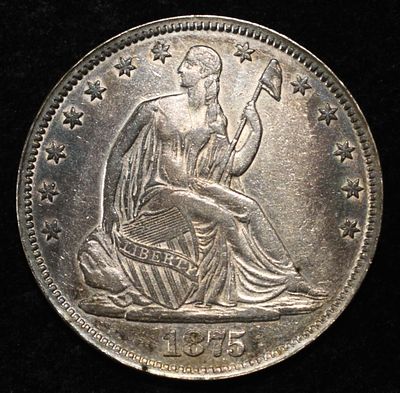 1875 SEATED LIBERTY HALF DOLLAR AU RIM FILED. BID WITH SILVER CITY AUCTIONS ESTIMATE $350 - $400.