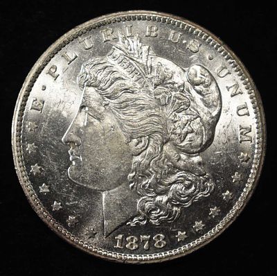 1878-CC MORGAN DOLLAR CH BU. CHECK OUT OUR UPCOMING AUCTIONS ESTIMATE $550 - $650.