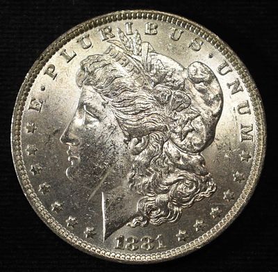 1881-O MORGAN DOLLAR BU. BID WITH SILVER CITY AUCTIONS ESTIMATE $100 - $130.