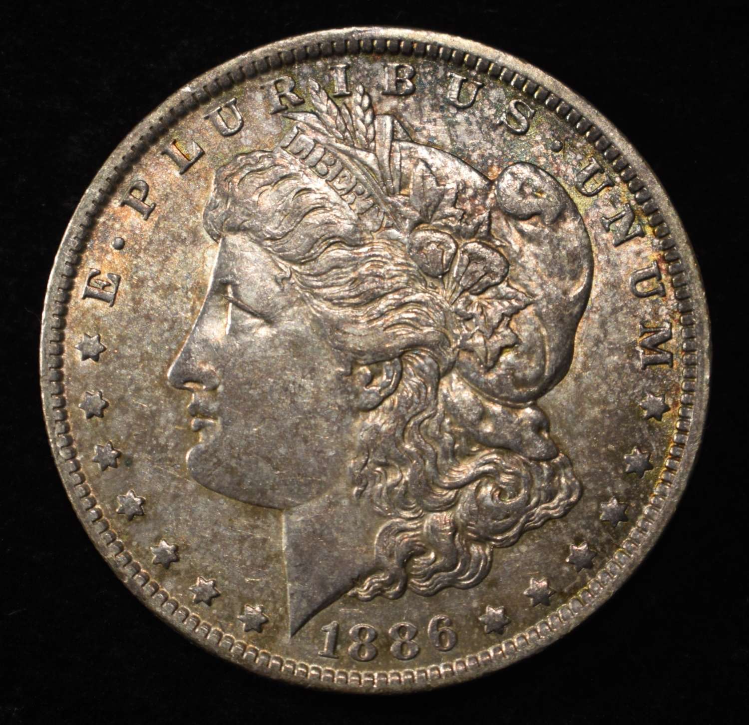 1886-O MORGAN DOLLAR AU