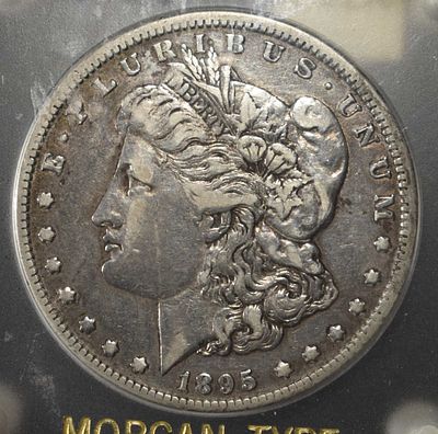 1895-O MORGAN DOLLAR XF. BID WITH SILVER CITY AUCTIONS ESTIMATE $800 - $900.