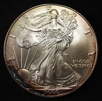 2000 AMERICAN SILVER EAGLE. BID WITH SILVER CITY AUCTIONS ESTIMATE $90 - $130.