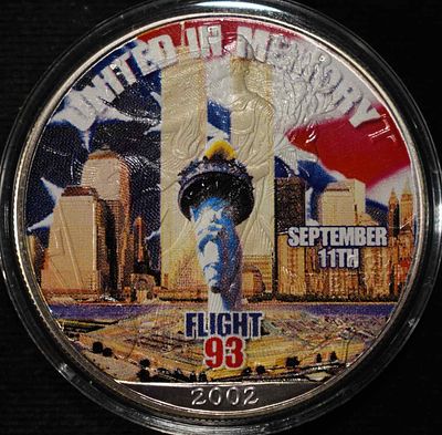 2002 AMERICAN SILVER EAGLE PAINTED MEMORIAL 9/11. CHECK OUT OUR UPCOMING AUCTIONS ESTIMATE $90 - 