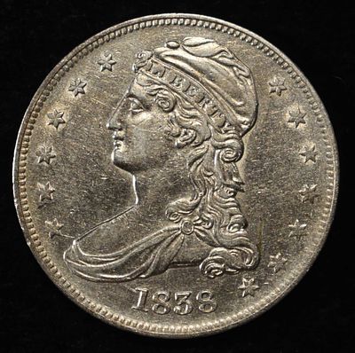 1838 BUST HALF DOLLAR AU/BU. BID WITH SILVER CITY AUCTIONS ESTIMATE $900 - $1000.