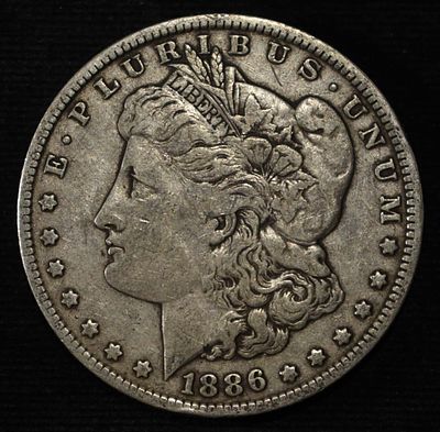 1886-O MORGAN DOLLAR VF. TOP RATED AUCTION HOUSE ESTIMATE $75 - $100.