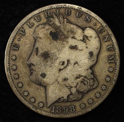 1898-S MORGAN DOLLAR. BID WITH SILVER CITY AUCTIONS ESTIMATE $80 - $120.
