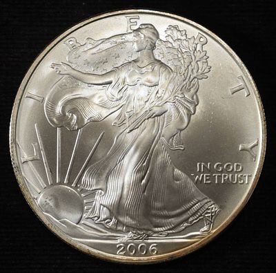 2006 AMERICAN SILVER EAGLE. TOP RATED AUCTION HOUSE ESTIMATE $90 - $130.