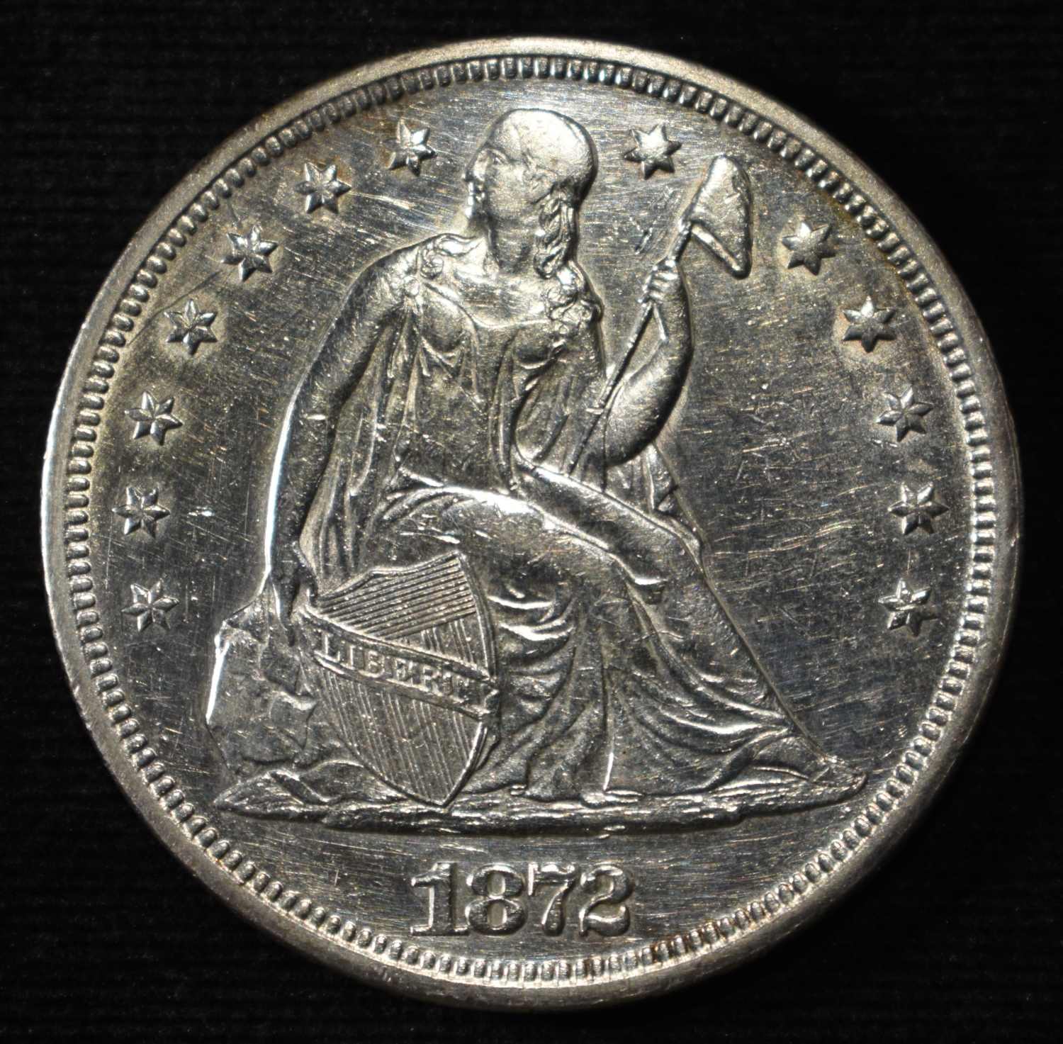 1872 SEATED LIBERTY DOLLAR CH AU