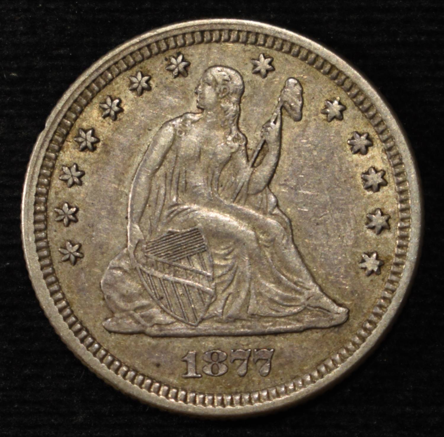 1877 SEATED LIBERTY QUARTER CH AU