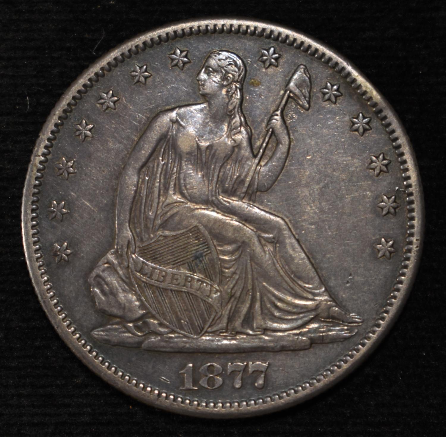 1877-S SEATED LIBERTY HALF DOLLAR AU