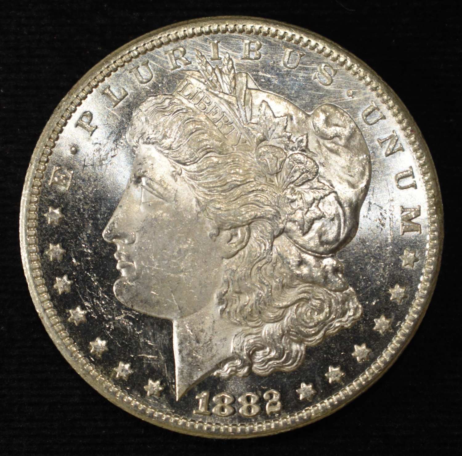 1882-CC MORGAN DOLLAR CH TO GEM BU DMPL