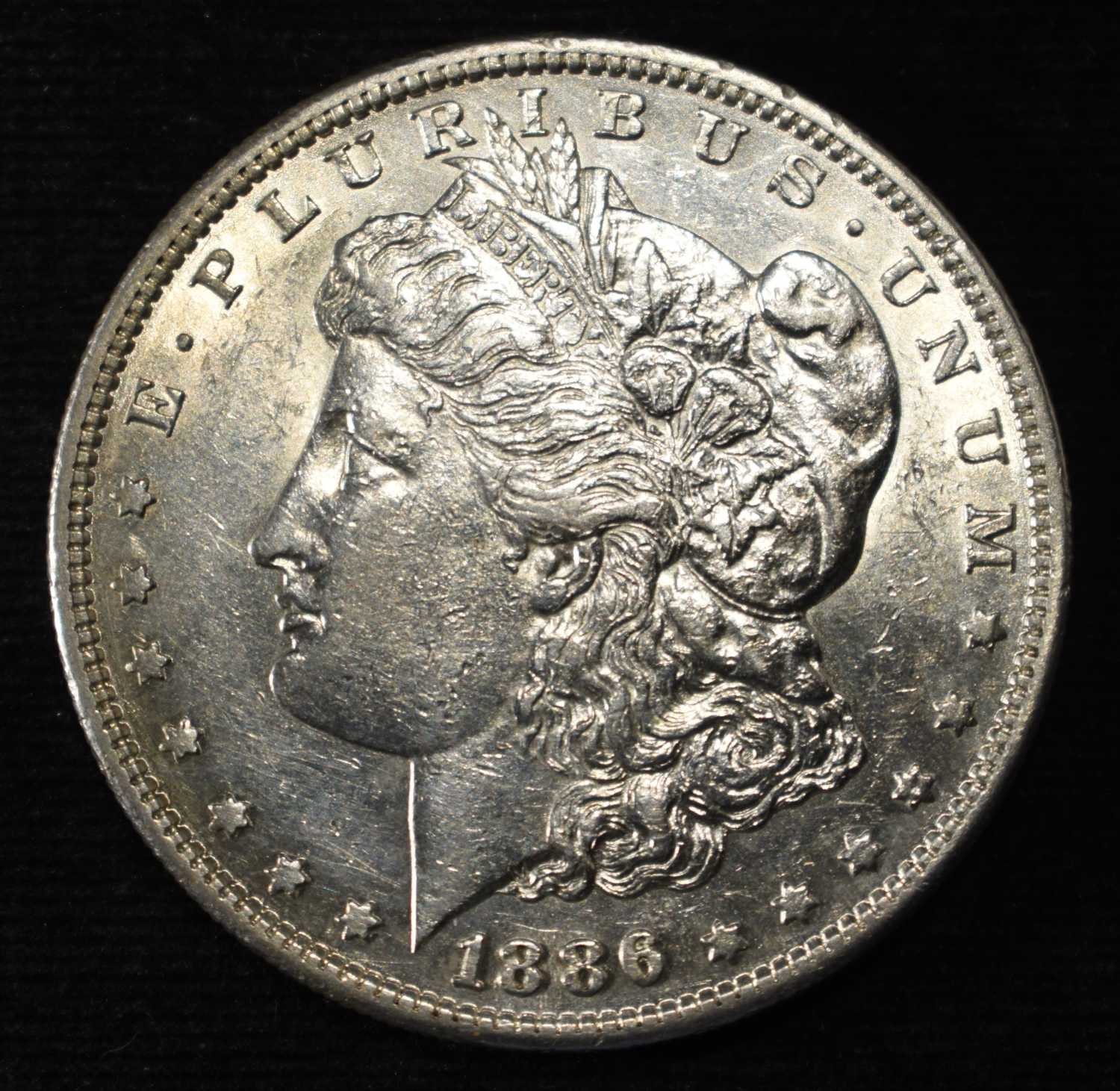 1886-S MORGAN DOLLAR AU/BU