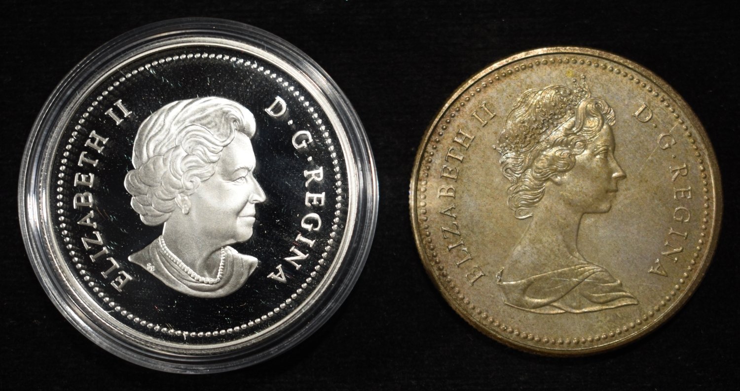 (2) CANADIAN SILVER DOLLARS APPROX ASW 1.1