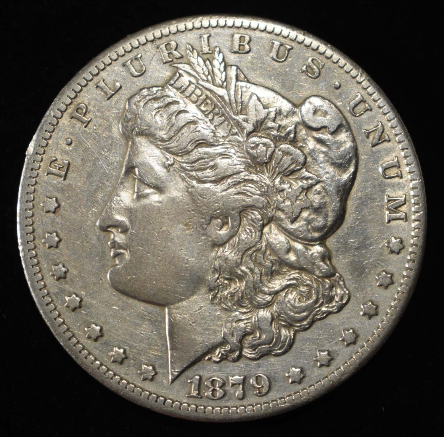 1879-CC MORGAN DOLLAR AU