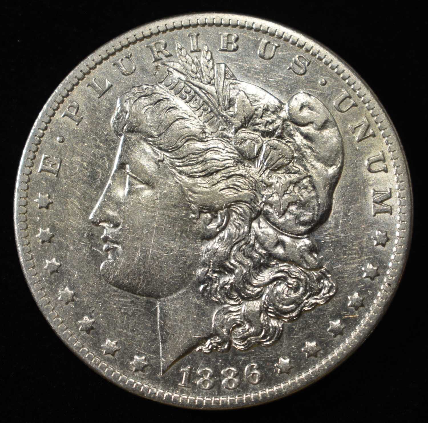 1886-O MORGAN DOLLAR AU