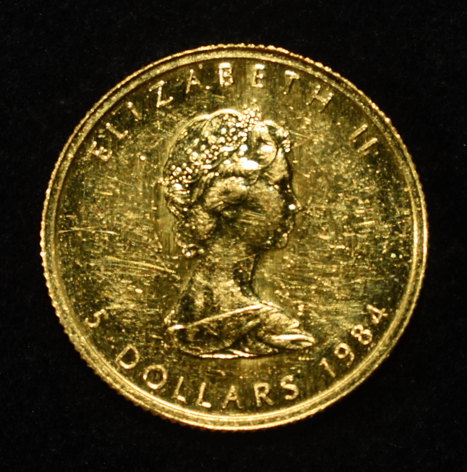 1984 $5 1/10TH OZ GOLD MAPLE LEAF