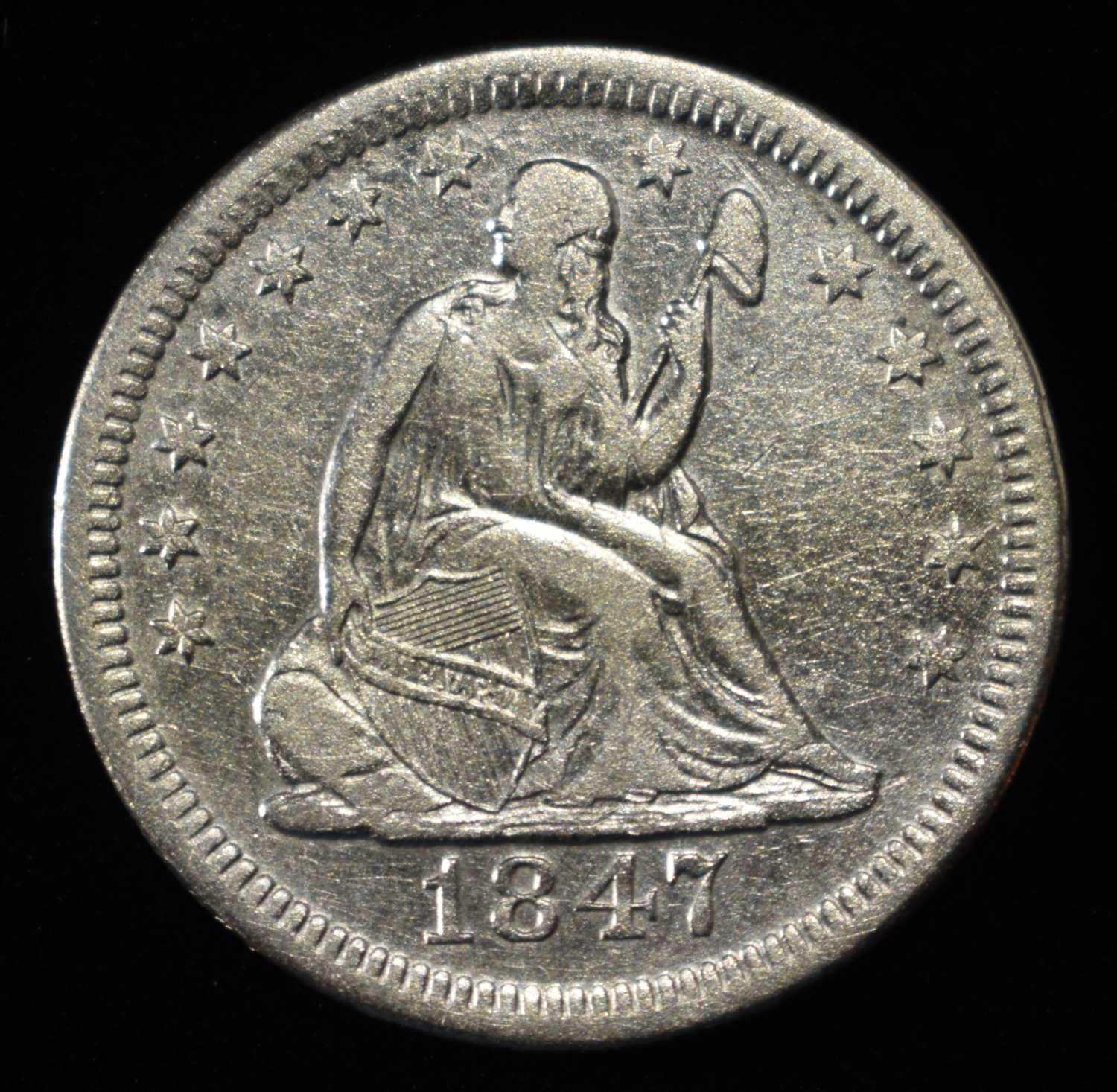 1847-O LIBERTY SEATED QUARTER CLEANED VF