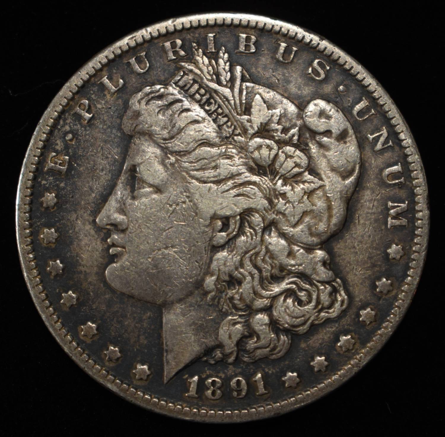 1891-S MORGAN DOLLAR .