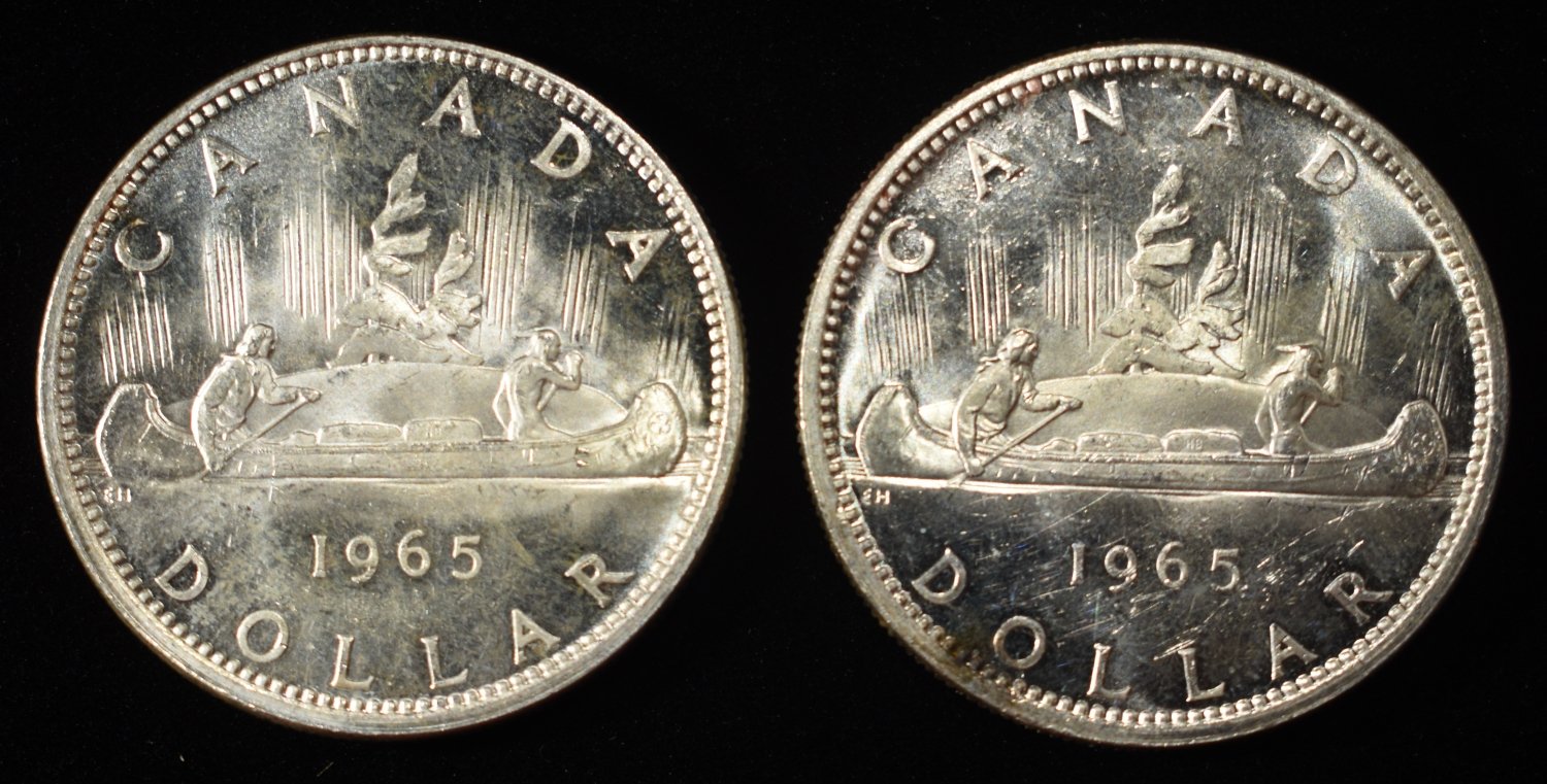 (2) 80% SILVER $1 CANADIAN COINS
