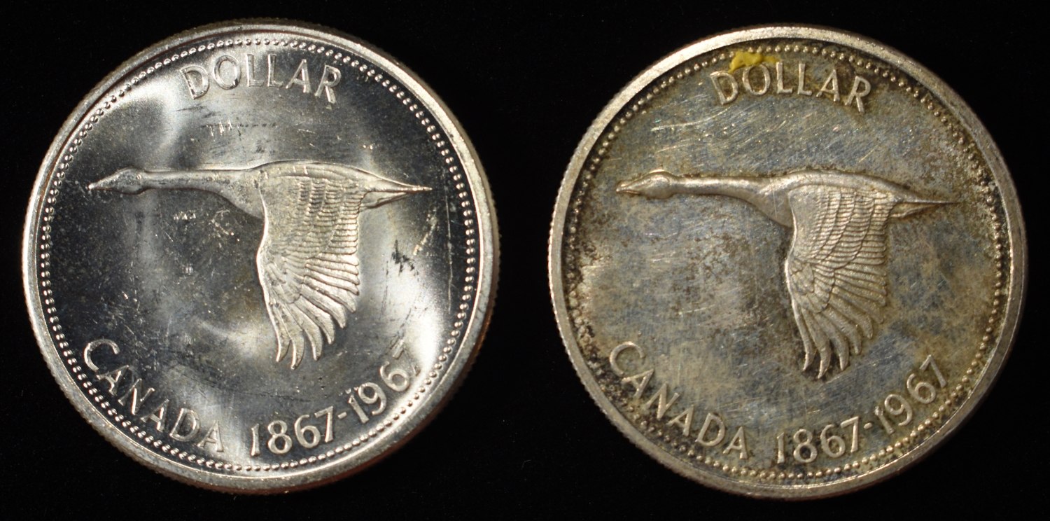 (2) 80% SILVER $1 CANADIAN COINS