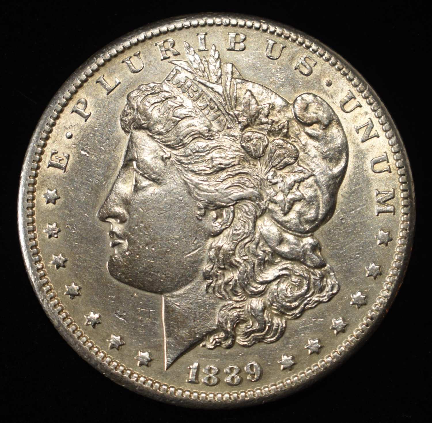 1889-CC MORGAN DOLLAR AU