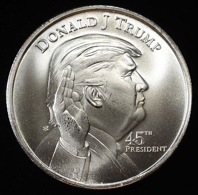 DONALD J. TRUMP 1 OZ 0.999 SILVER ROUND. BID WITH SILVER CITY AUCTIONS ESTIMATE $90 - $130.