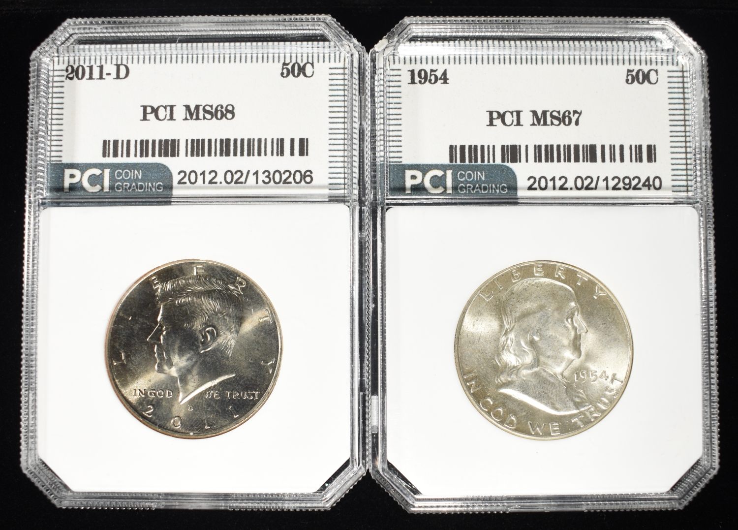 (2) GRADED HALF DOLLARS