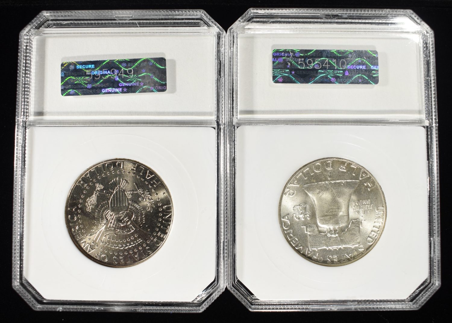 (2) GRADED HALF DOLLARS