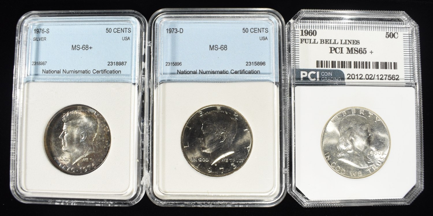 (3) GRADED HALF DOLLARS