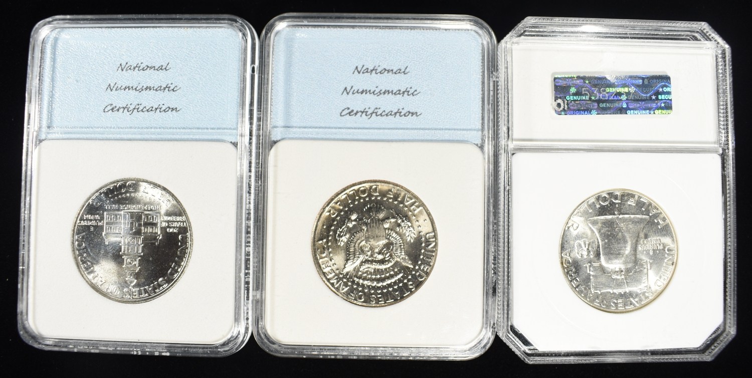(3) GRADED HALF DOLLARS