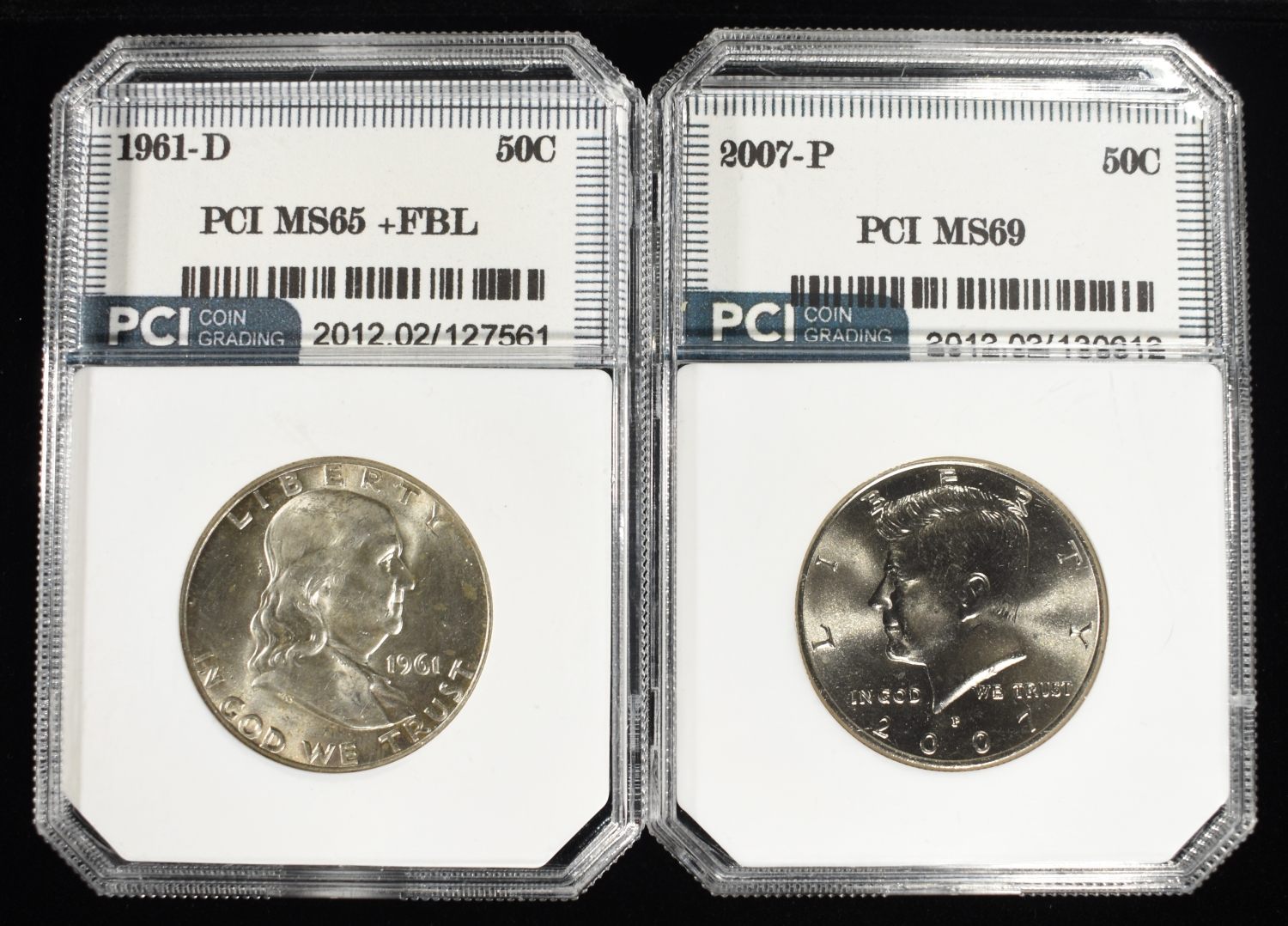 (2) GRADED HALF DOLLARS