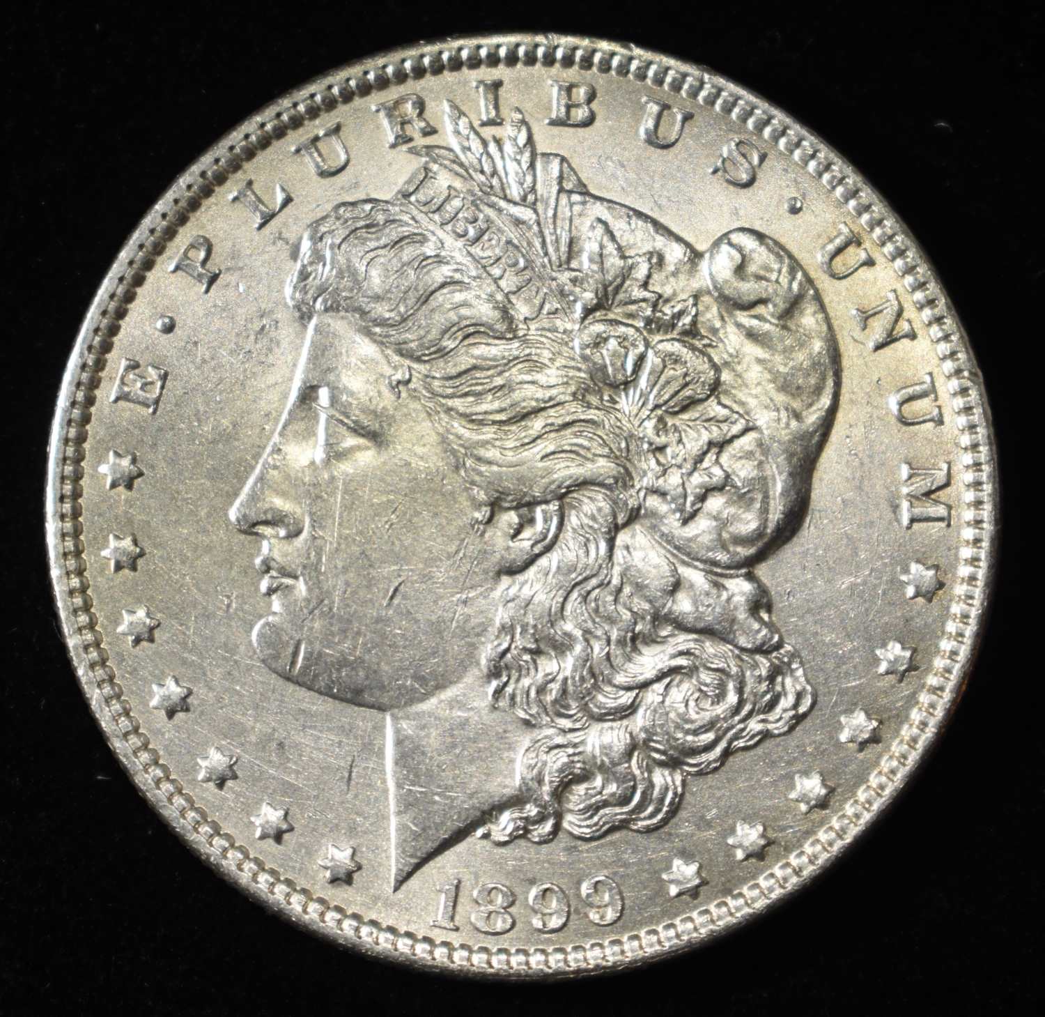 1899 MORGAN DOLLAR AU/BU