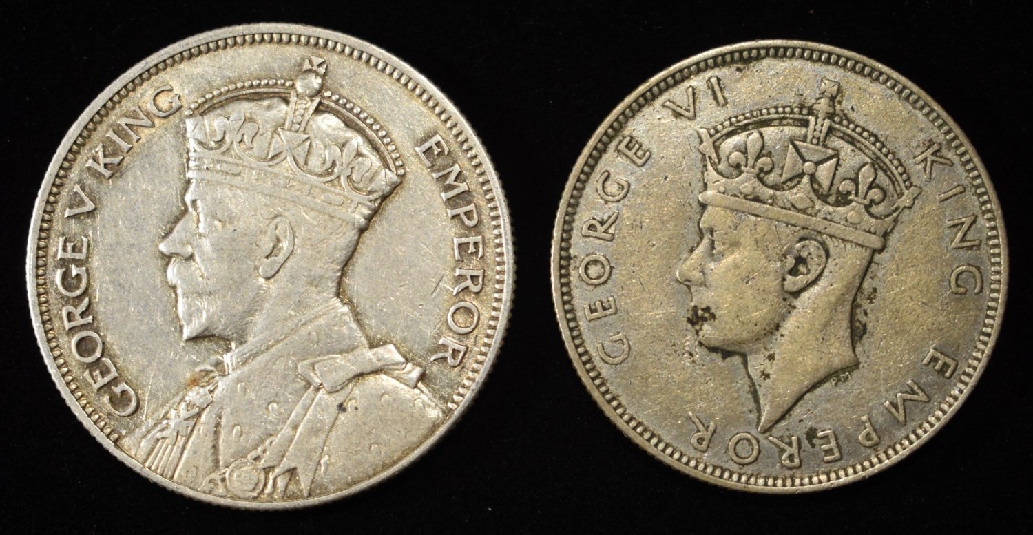 (2) FOREIGN SILVER COINS