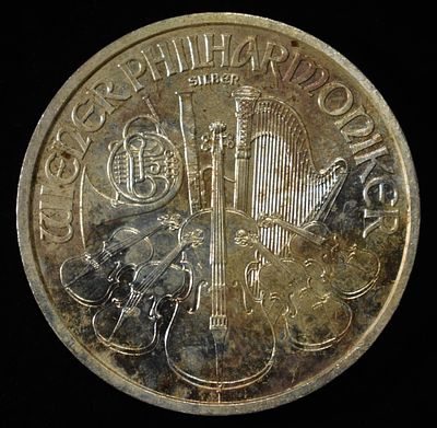 WIENER PHILHARMONIKER 1 OZ 0.999 SILVER ROUND. CHECK OUT OUR UPCOMING AUCTIONS ESTIMATE $100 - $150.