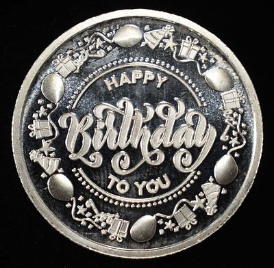HAPPY B-DAY 1/2 OZ 0.999 SILVER ROUND. CHECK OUT OUR UPCOMING AUCTIONS ESTIMATE $60 - $80.