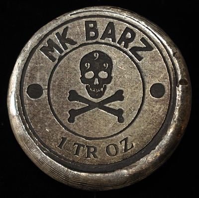 MK BARZ 1 OZ .999 SILVER ROUND. BID WITH SILVER CITY AUCTIONS ESTIMATE $110 - $160.