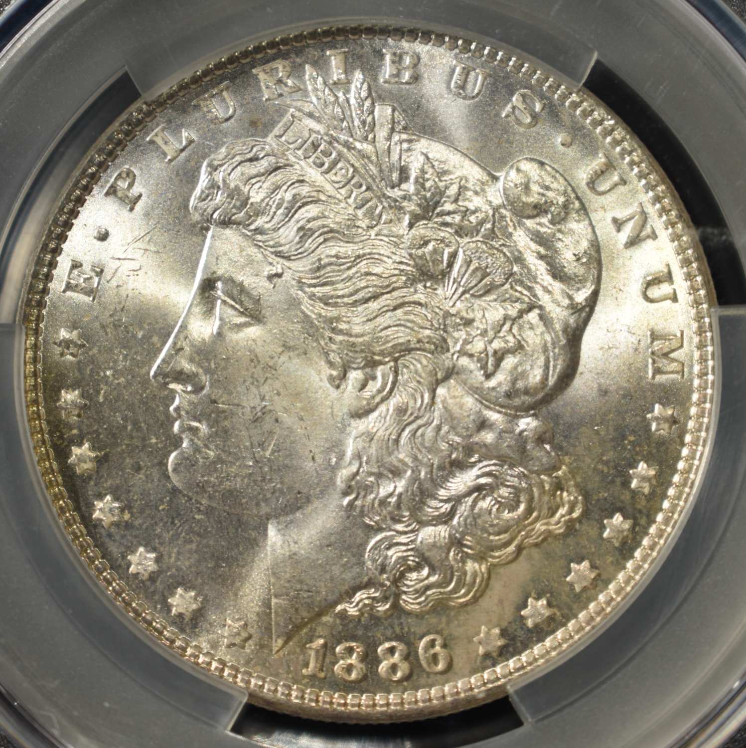 1886 MORGAN DOLLAR CAC MS64